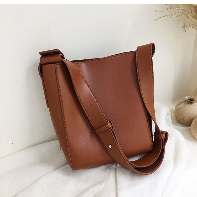 Designer shoulder bag with wide straps for women