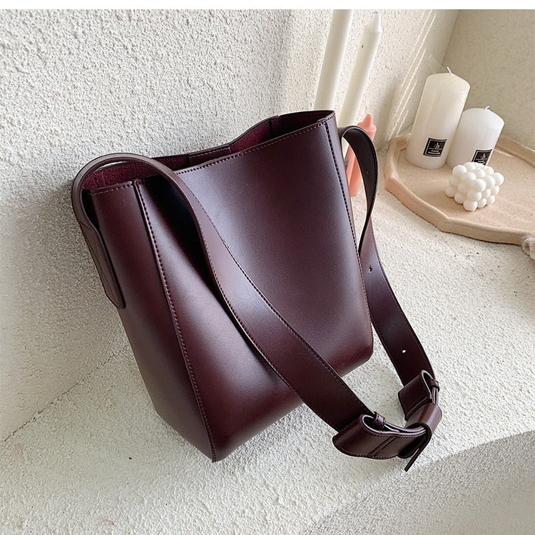Designer shoulder bag with wide straps for women