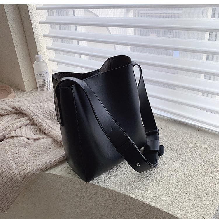 Designer shoulder bag with wide straps for women