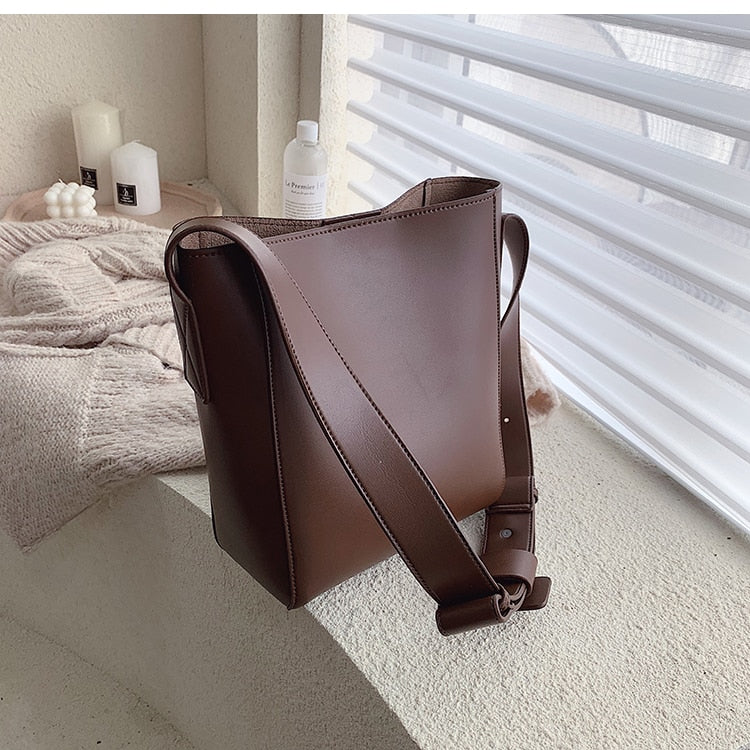 Designer shoulder bag with wide straps for women