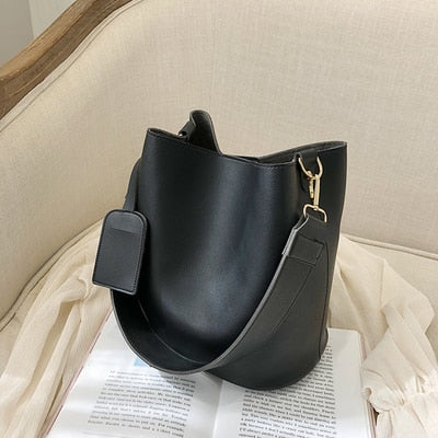 Designer shoulder bag with wide straps for women