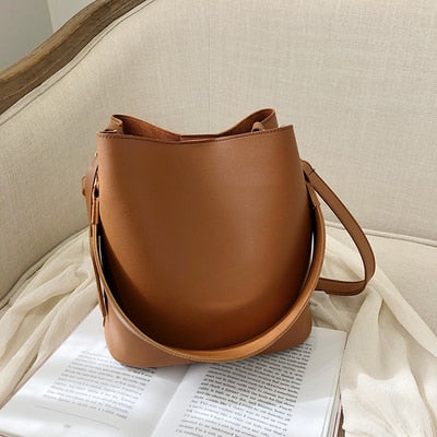 Designer shoulder bag with wide straps for women
